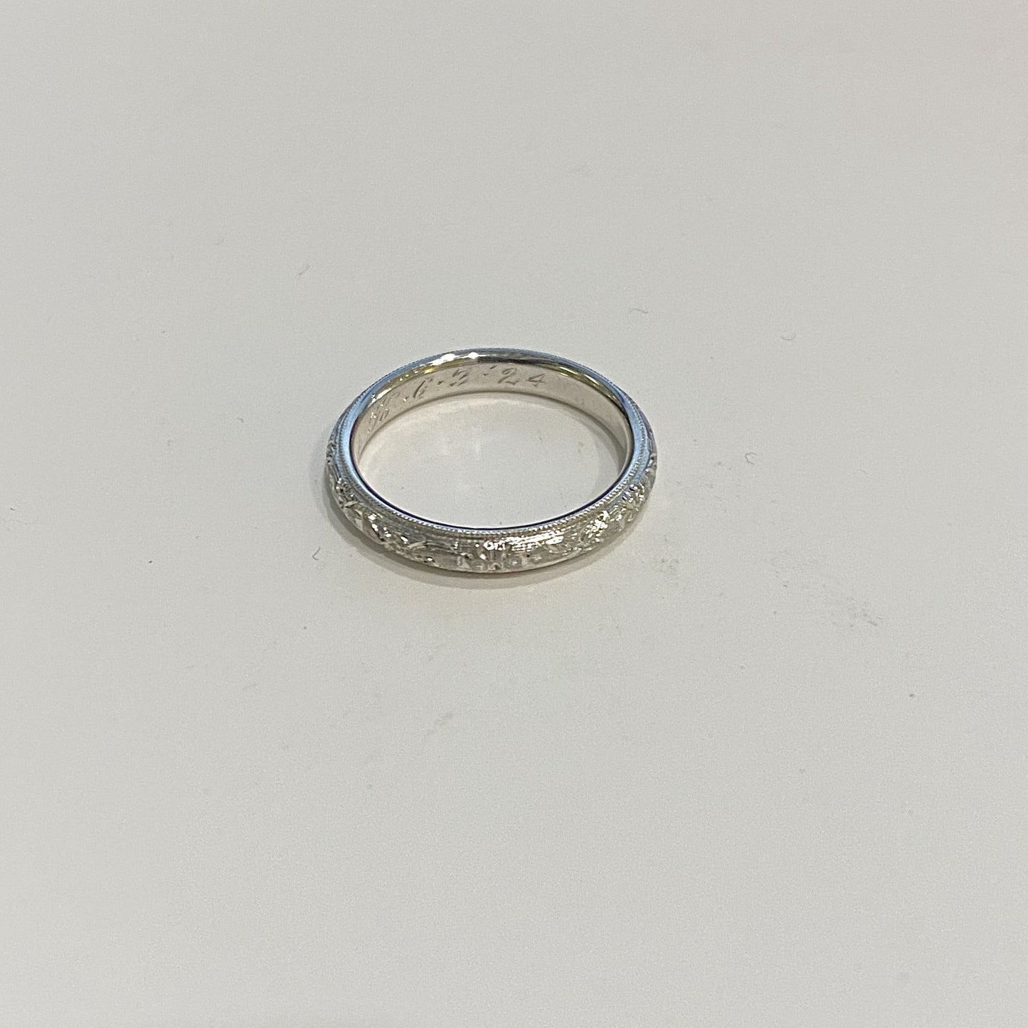 Estate platinum hand engraved wedding band C.1924