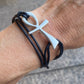 Happy Ankh Sterling Silver neckcord on leather.
