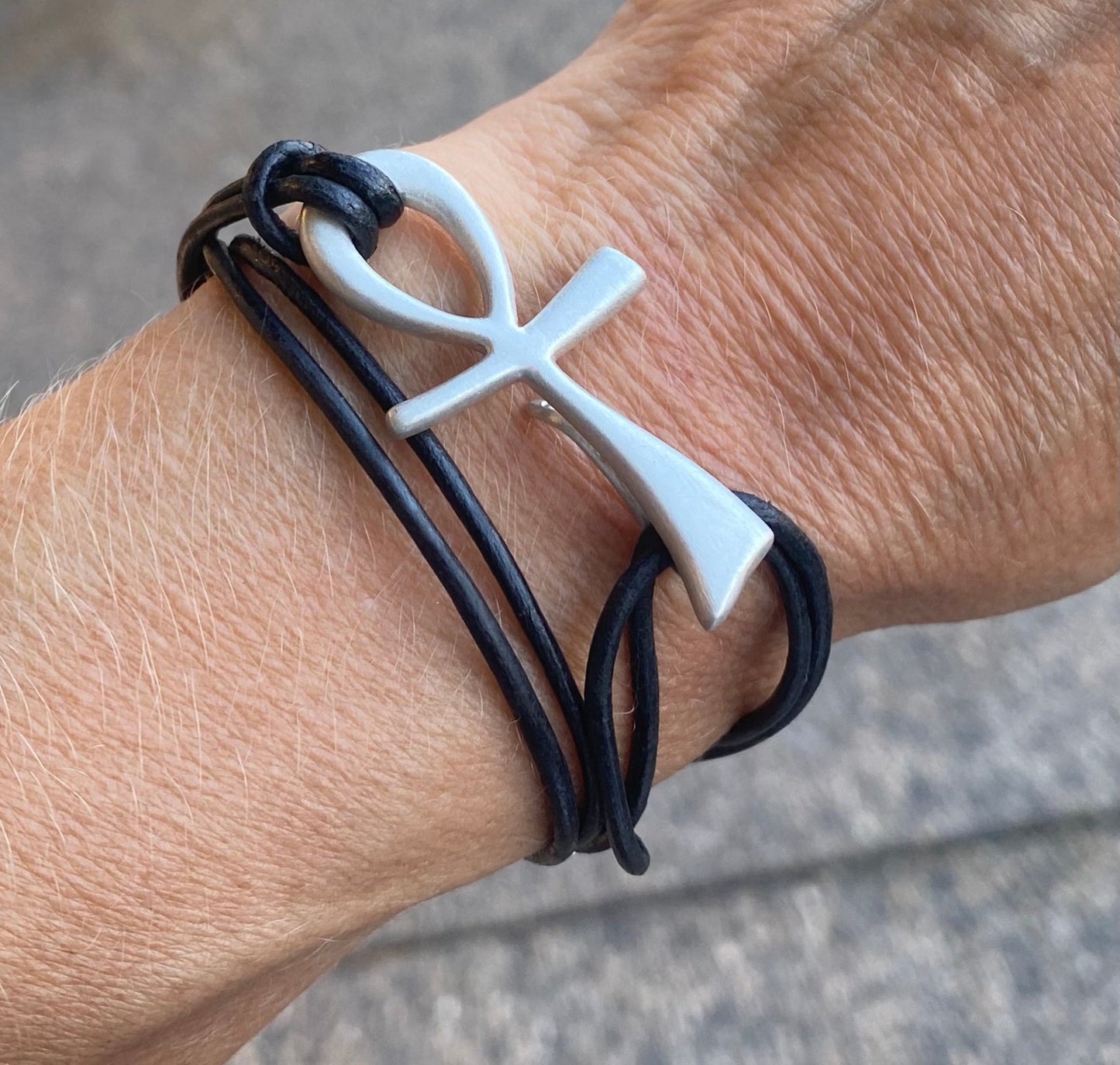 Happy Ankh Sterling Silver neckcord on leather.