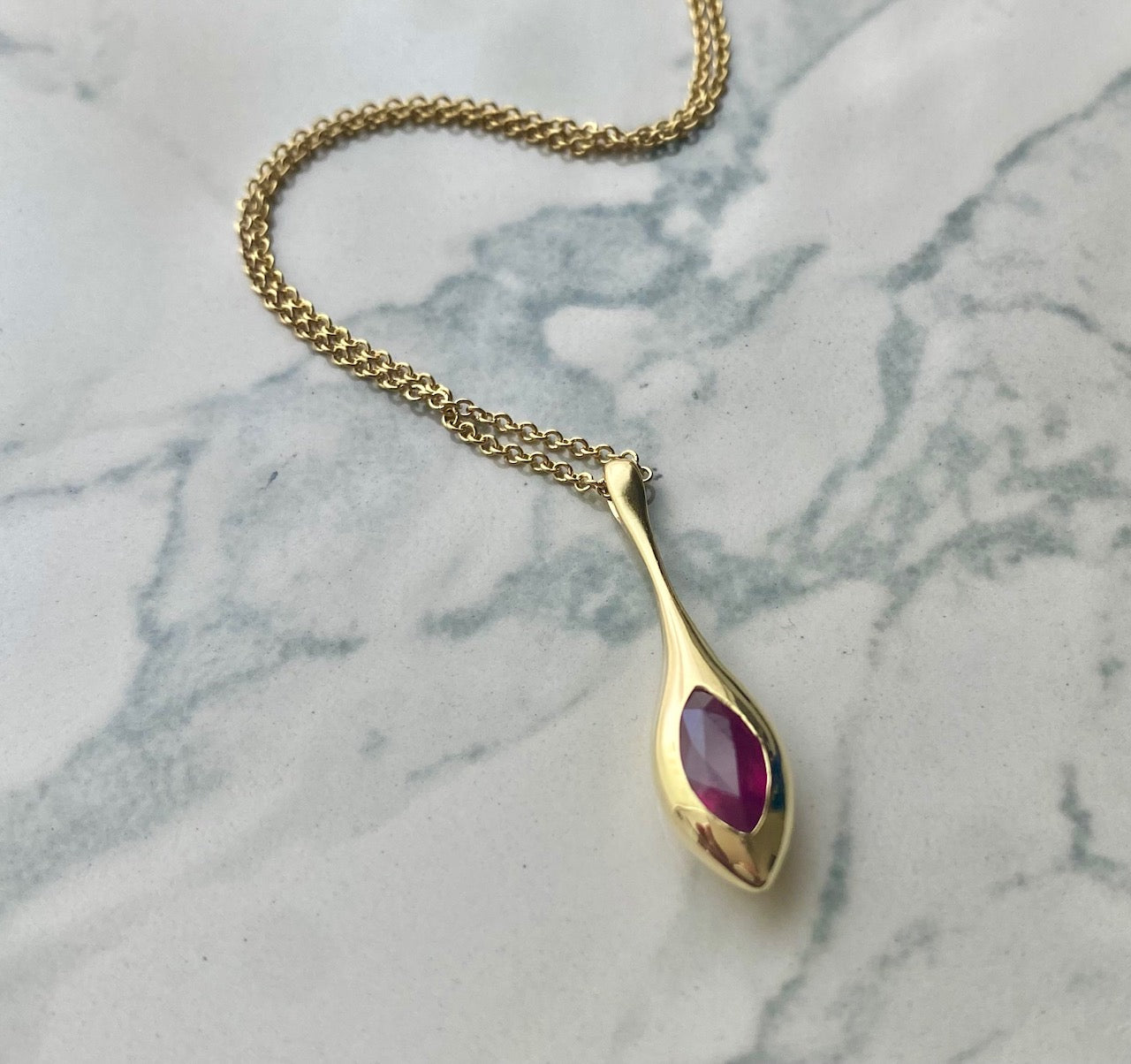 H20 Ruby .79ctw Marquise Drop Pendant in 18K YG