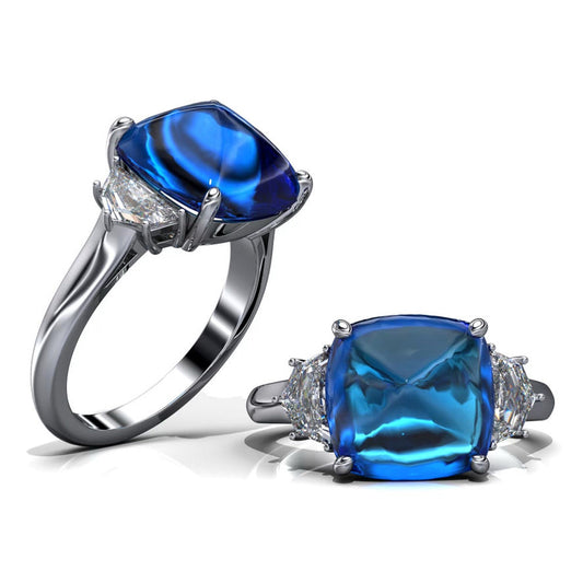 Adriatic Sea Sugarloaf Cabachon Blue Sapphire and 2 Cadillac Diamond Side Stones